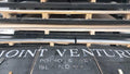 CNC laser-cut stainless steel boat numbers installed on hull